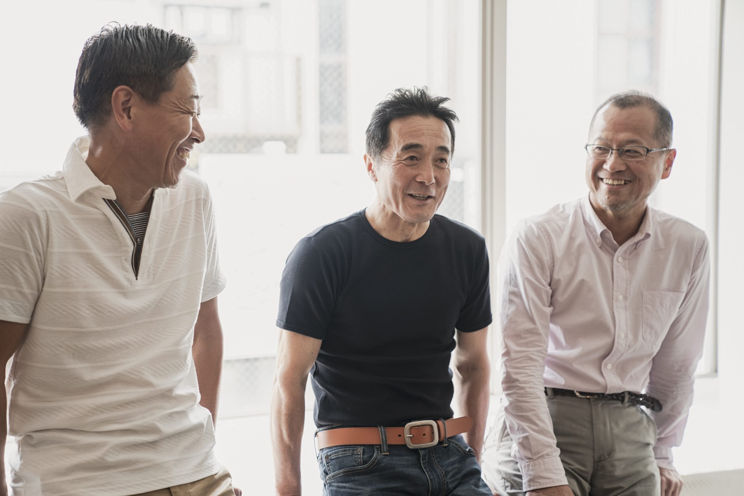 Family business owners discussing future leadership transition together