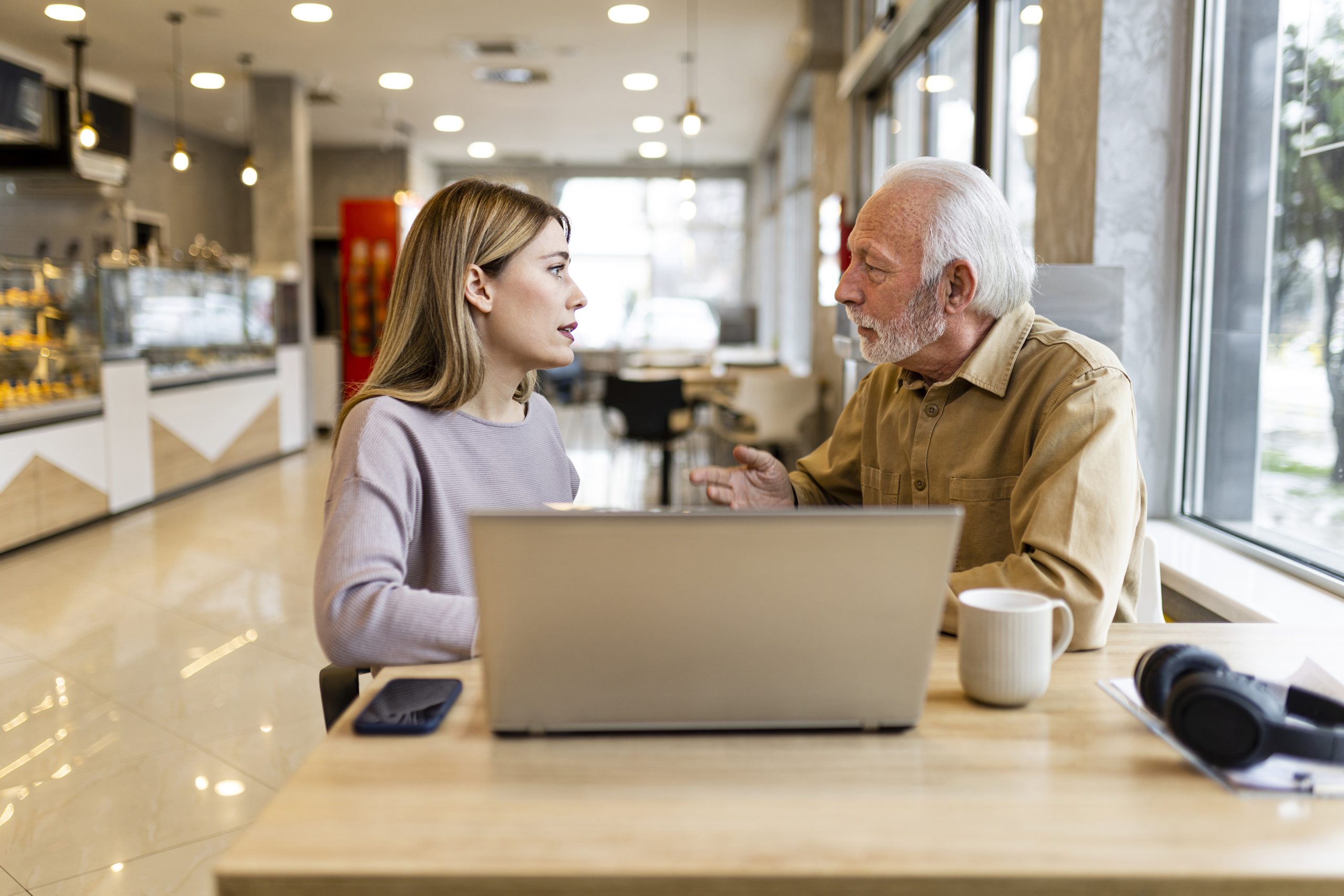 Two business people having an argument at coffee shop