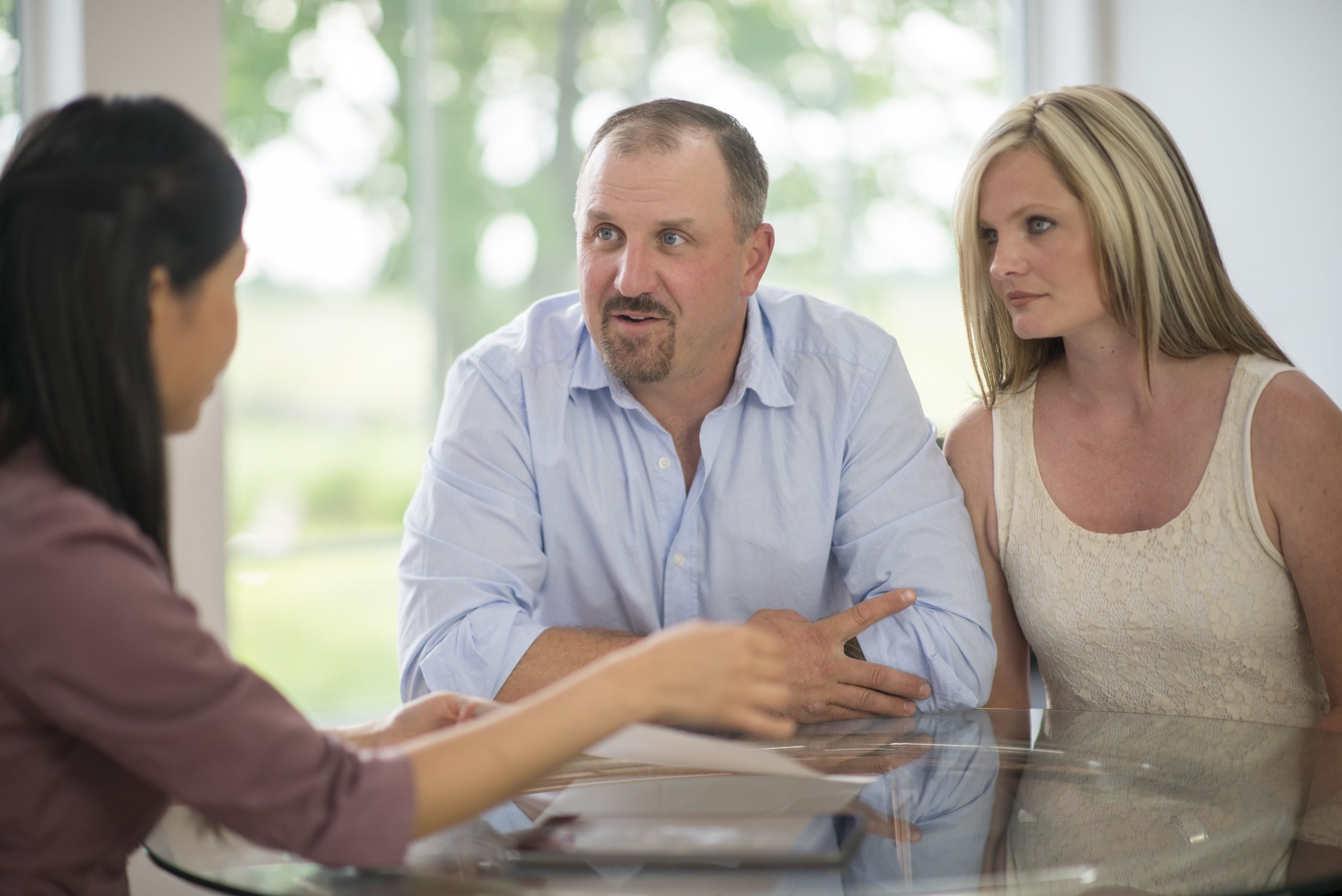 Couple meeting with a family business advisor, highlighting important questions to ask a family business consultant for clarity and guidance.