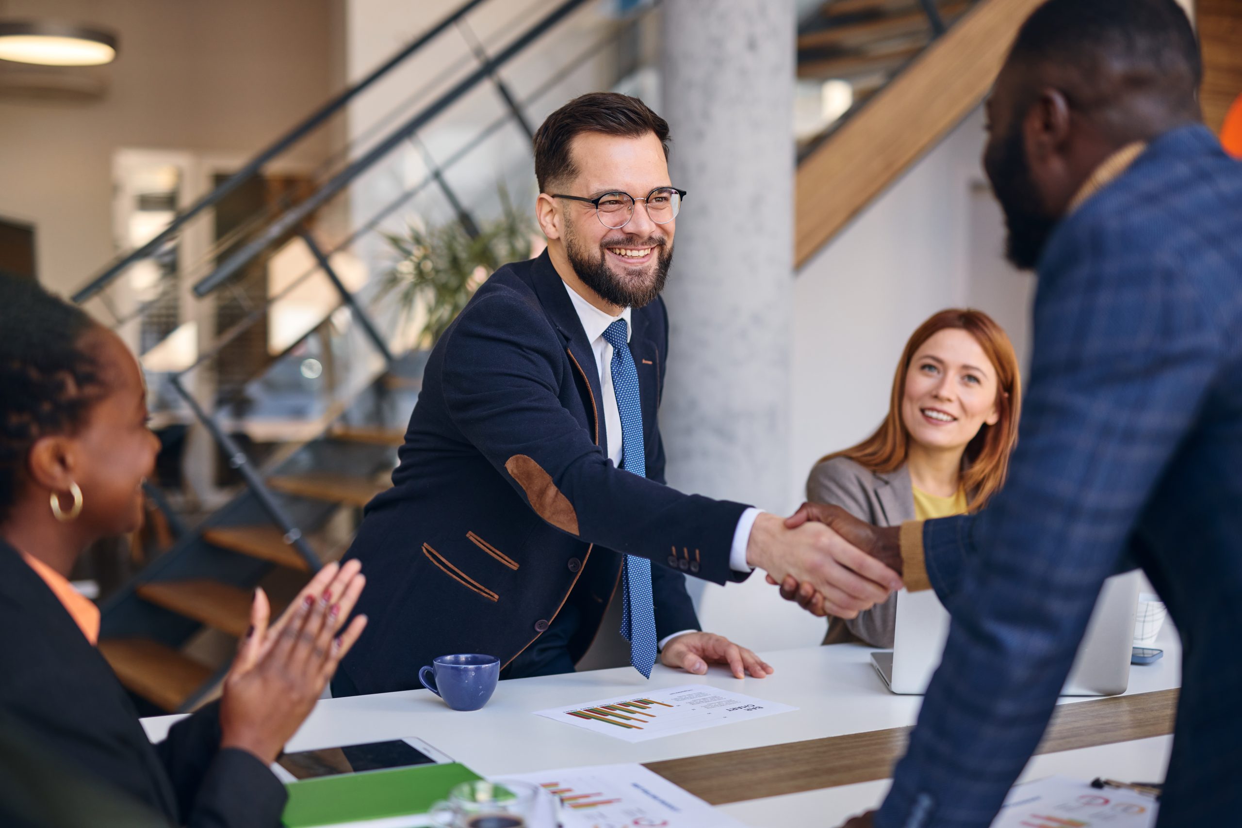 Business team meeting with a family business advisor, showing what makes a great family business advisor through trust, collaboration, and guidance.
